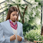 Woman wearing a colourful Silk  scarf in Buxton Victorian Green house
